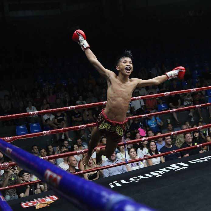 Bpaet celebrates after a Muay Thai fight